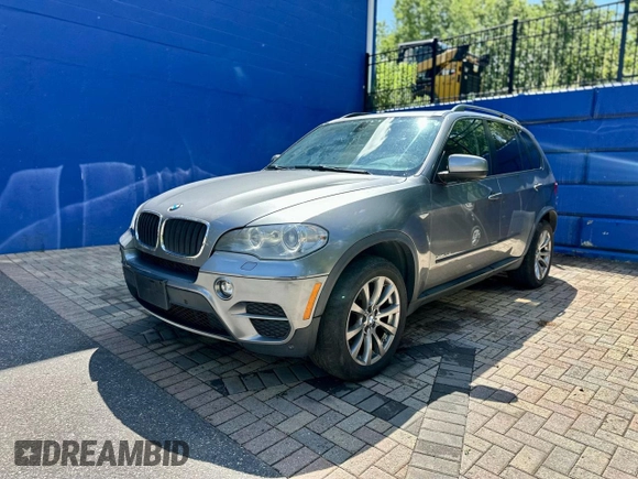 2012 BMW X5 35i with VIN 5UXZV4C55CL986439, listed as a Copart auction lot 63034725 with 188,238 mi miles and Clean title. Bid and sale history available at DreamBid. Image 2.