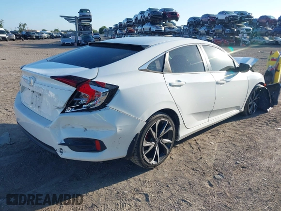 2017 Honda Civic LX with VIN 19XFC2F56HE004511, listed as a IAAI auction lot 42562420 with 59,975 mi miles and . Bid and sale history available at DreamBid. Image 4.