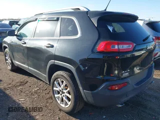 2014 Jeep Cherokee Latitude z VIN 1C4PJMCS2EW124467, wystawiony jako IAAI lot #41944747 z przebiegiem 132 890 mil mil oraz . Historia ofert i sprzedaży dostępna na DreamBid. Obrazek 3.