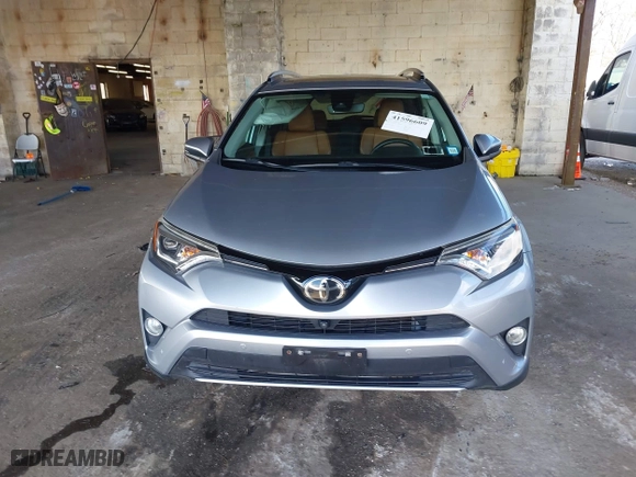 2018 Toyota RAV4 Limited with VIN 2T3DFREV4JW709049, listed as a IAAI auction lot 41596609 with 50,860 mi miles. Bid and sale history available at carsss.com. Image 12.