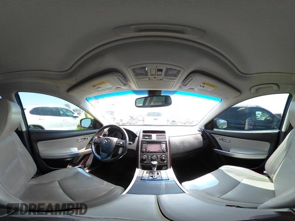 2015 Mazda CX-9 Grand Touring with VIN JM3TB3DA0F0459024, listed as a IAAI auction lot 42452288 with 174,716 mi miles and . Bid and sale history available at DreamBid. Image 18.