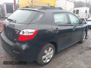 2009 Toyota Matrix S with VIN 2T1LE40E29C004183, listed as a IAAI auction lot 41698226 with 233,914 mi miles. Bid and sale history available at carsss.com. Image 4.