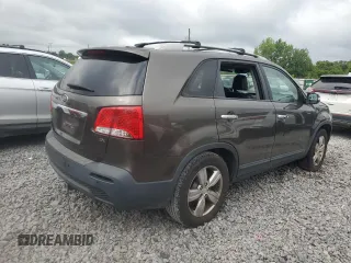 2012 Kia Sorento EX z VIN 5XYKU3A69CG279061, wystawiony jako Copart lot #60088605 z przebiegiem 272 332 mil mil oraz Czysty tytuł • Clean title. Historia ofert i sprzedaży dostępna na DreamBid. Obrazek 3.