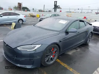 2022 Tesla Model S with VIN 5YJSA1E52NF459460, listed as a IAAI auction lot 41736236 with Not Provided miles and . Bid and sale history available at DreamBid. Image 20.
