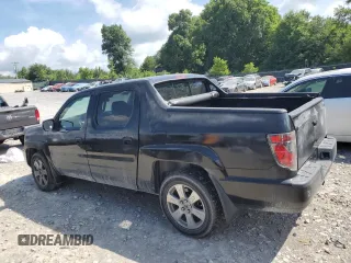 2013 Honda Ridgeline RTL with VIN 5FPYK1F58DB018136, listed as a Copart auction lot 61720925 with 184,020 mi miles and Salvage title. Bid and sale history available at DreamBid. Image 2.