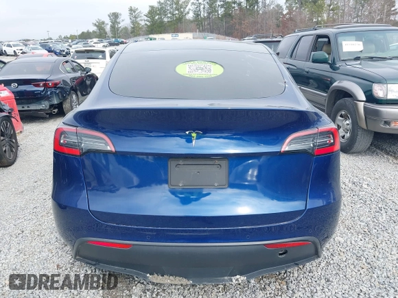 2021 Tesla Model Y Standard Range with VIN 5YJYGDED8MF122985, listed as a IAAI auction lot 41430423 with 120,302 mi miles and . Bid and sale history available at carsss.com. Image 15.