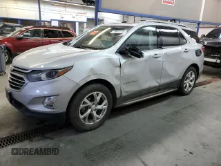 2020 Chevrolet Equinox Premier z VIN 2GNAXXEV3L6128099, wystawiony jako Copart lot #79041114 z przebiegiem 65 856 mil mil oraz Szkoda całkowita • Salvage title. Historia ofert i sprzedaży dostępna na DreamBid. Obrazek 1.