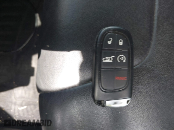 2014 Jeep Cherokee Trailhawk with VIN 1C4PJMBS5EW231448, listed as a IAAI auction lot 42632143 with 97,461 mi miles and . Bid and sale history available at DreamBid. Image 11.