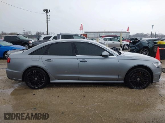 2016 Audi A6 2.0T Premium Plus with VIN WAUGFAFC1GN014536, listed as a IAAI auction lot 41937616 with 122,417 mi miles. Bid and sale history available at carsss.com. Image 13.