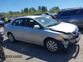 2012 Toyota Corolla L with VIN 2T1BU4EEXCC818354, listed as a IAAI auction lot 42129695 with 216,307 mi miles. Bid and sale history available at carsss.com. Image 14.