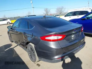 2015 Ford Fusion S Hybrid with VIN 3FA6P0UU2FR105754, listed as a IAAI auction lot 41631104 with 185,114 mi miles. Bid and sale history available at carsss.com. Image 3.