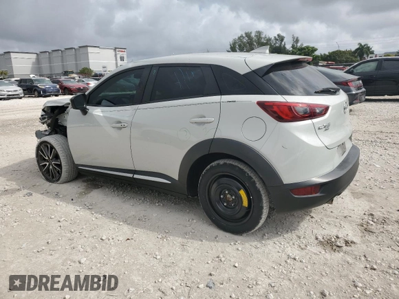 2017 Mazda CX-3 Grand Touring with VIN JM1DKFD76H0170333, listed as a Copart auction lot 43772595 with 59,693 mi miles and Salvage Title. Bid and sale history available at carsss.com. Image 2.