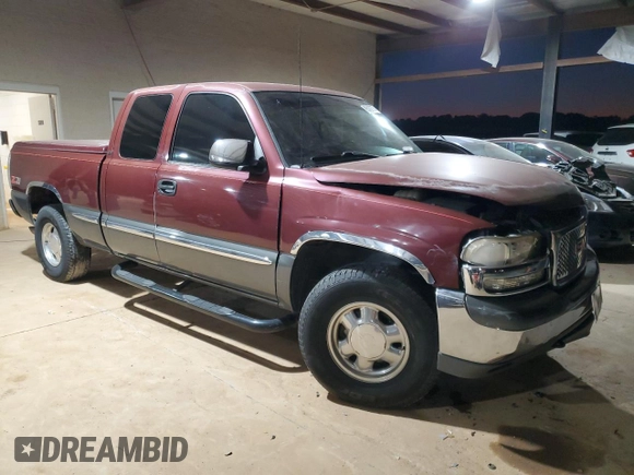2000 GMC New Sierra 1500 SLE with VIN 1GTEK19T3YE218791, listed as a Copart auction lot 82482734 with 242,277 mi miles and Salvage Title. Bid and sale history available at carsss.com. Image 4.