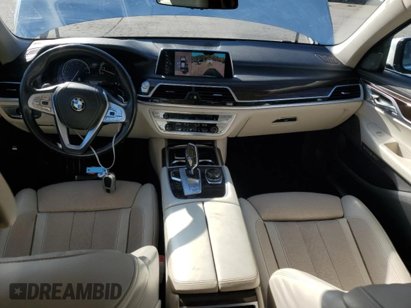 2016 BMW 7 Series 740i with VIN WBA7E2C54GG547970, listed as a Copart auction lot 71097393 with 60,464 mi miles. Bid and sale history available at carsss.com. Image 8.