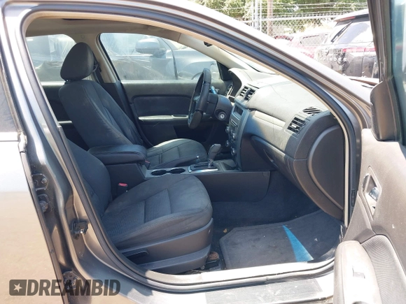 2010 Ford Fusion SE with VIN 3FAHP0HA0AR352188, listed as a IAAI auction lot 42004772 with 227,687 mi miles. Bid and sale history available at carsss.com. Image 5.