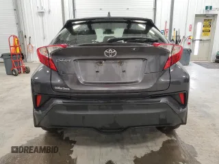 2019 Toyota C-HR XLE with VIN JTNKHMBX0K1035830, listed as a Copart auction lot 52561095 with 98,412 mi miles and Clean Title. Bid and sale history available at carsss.com. Image 6.
