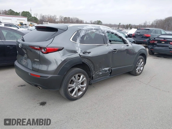 2022 Mazda CX-30 S Premium with VIN 3MVDMBDL9NM434619, listed as a IAAI auction lot 41620655 with 46,557 mi miles and . Bid and sale history available at carsss.com. Image 4.