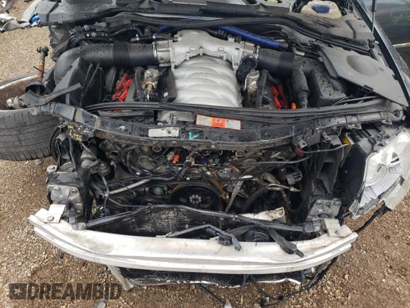 2007 Audi S8 z VIN WAUPN44E87N017815, wystawiony jako Copart lot #60161364 z przebiegiem Nie podano mil oraz Szkoda całkowita • Salvage title. Historia ofert i sprzedaży dostępna na DreamBid. Obrazek 11.