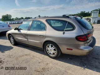2005 Mercury Sable LS Premium with VIN 1MEFM59S25A604780, listed as a Copart auction lot 62909095 with 113,909 mi miles and Non repairable. Bid and sale history available at DreamBid. Image 2.