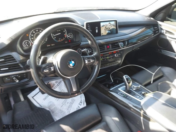 2017 BMW X5 sDrive35i with VIN 5UXKR2C32H0X05912, listed as a IAAI auction lot 41626281 with 57,618 mi miles. Bid and sale history available at carsss.com. Image 20.