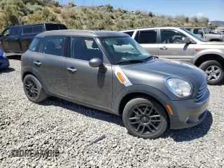 2014 MINI Countryman with VIN WMWZB3C56EWR38919, listed as a Copart auction lot 61385865 with 127,368 mi miles and Salvage title. Bid and sale history available at DreamBid. Image 4.