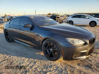 2015 BMW M6 z VIN WBS6C9C52FD468030, wystawiony jako Copart lot #81739974 z przebiegiem 66 861 mil mil oraz Szkoda całkowita • Salvage title. Historia ofert i sprzedaży dostępna na DreamBid. Obrazek 4.