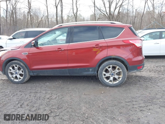 2015 Ford Escape Titanium with VIN 1FMCU9JX1FUA56091, listed as a IAAI auction lot 41947035 with 191,297 mi miles and . Bid and sale history available at DreamBid. Image 14.