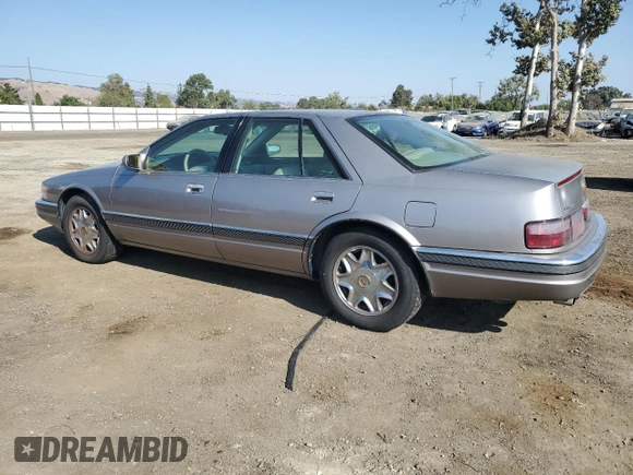1997 Cadillac Seville Luxury SLS with VIN 1G6KS52Y0VU801906, listed as a Copart auction lot 65169364 with 191,627 mi miles and Salvage Title. Bid and sale history available at carsss.com. Image 2.