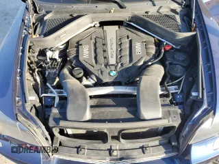 2014 BMW X6 50i z VIN 5UXFG8C53EL592803, wystawiony jako Copart lot #79621904 z przebiegiem 154 595 mil mil oraz Szkoda całkowita • Salvage title. Historia ofert i sprzedaży dostępna na DreamBid. Obrazek 12.