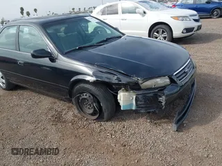 2001 Toyota Camry CE with VIN JT2BG22K910548345, listed as a IAAI auction lot 41723835 with 170,228 mi miles and . Bid and sale history available at DreamBid. Image 6.