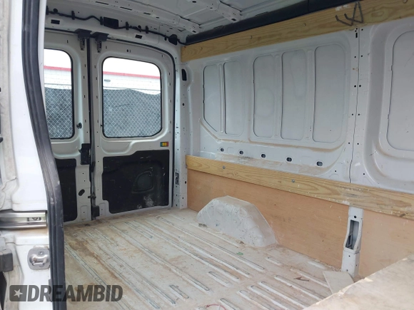 2021 Ford Transit Cargo with VIN 1FTBR1C85MKA12810, listed as a IAAI auction lot 41610132 with 105,724 mi miles and . Bid and sale history available at DreamBid. Image 8.