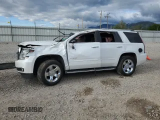 2016 Chevrolet Tahoe LTZ z VIN 1GNSKCKC4GR390464, wystawiony jako Copart lot #55844355 z przebiegiem 109 740 mil mil oraz Szkoda całkowita • Salvage title. Historia ofert i sprzedaży dostępna na DreamBid. Obrazek 1.