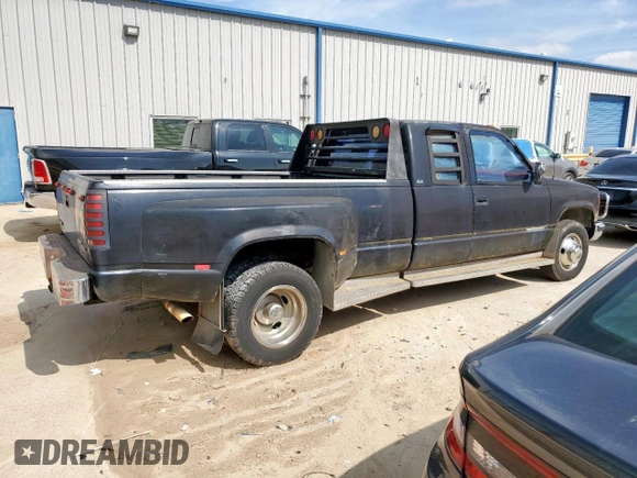 1992 GMC Sierra 1500 with VIN 2GTHC39NXN1556192, listed as a Copart auction lot 55469485 with 128,938 mi miles and Clean Title. Bid and sale history available at DreamBid. Image 3.