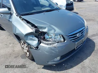 2010 Hyundai Elantra GLS z VIN KMHDU4AD5AU952996, wystawiony jako IAAI lot #42297712 z przebiegiem 258 104 mil mil oraz . Historia ofert i sprzedaży dostępna na DreamBid. Obrazek 6.