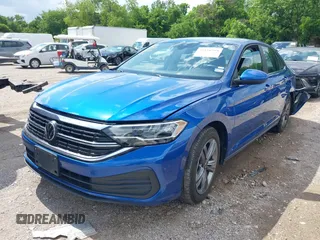 2024 Volkswagen Jetta SE with VIN 3VWEM7BU9RM007894, listed as a IAAI auction lot 42116799 with 35,023 mi miles and . Bid and sale history available at DreamBid. Image 2.