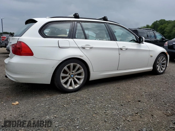 2011 BMW 3 Series 328i xDrive with VIN WBAUU3C5XBA542974, listed as a Copart auction lot 63331535 with 276,912 mi miles and Salvage title. Bid and sale history available at DreamBid. Image 3.