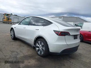 2023 Tesla Model Y Long Range z VIN 7SAYGDEE4PF621640, wystawiony jako IAAI lot #41796502 z przebiegiem 68 484 mil mil oraz . Historia ofert i sprzedaży dostępna na DreamBid. Obrazek 3.