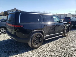 2023 Rivian R1S Adventure with VIN 7PDSGABA3PN012584, listed as a Copart auction lot 47557575 with 8,633 mi miles and Salvage Title. Bid and sale history available at carsss.com. Image 3.