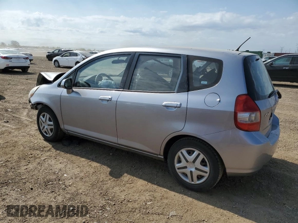 2007 Honda Fit z VIN JHMGD38497S025472, wystawiony jako Copart lot #55901095 z przebiegiem 120 216 mil mil oraz Szkoda całkowita • Salvage title. Historia ofert i sprzedaży dostępna na DreamBid. Obrazek 2.