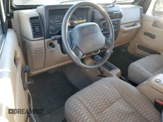 1999 Jeep Wrangler Sport with VIN 1J4FY19S5XP482053, listed as a Copart auction lot 75925774 with 112,503 mi miles and Salvage Title. Bid and sale history available at carsss.com. Image 8.
