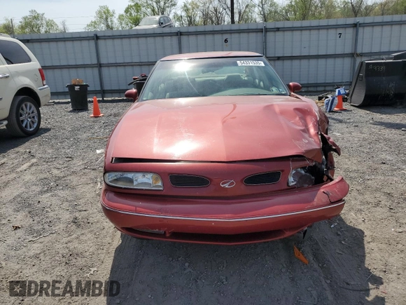 1998 Oldsmobile 88 LS z VIN 1G3HN52K2W4809677, wystawiony jako Copart lot #54331535 z przebiegiem 99 587 mil mil oraz Szkody całkowita. Historia ofert i sprzedaży dostępna na DreamBid. Obrazek 5.