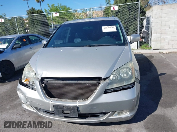 2005 Honda Odyssey TOURING with VIN 5FNRL38865B128519, listed as a IAAI auction lot 41830182 with 171,010 mi miles. Bid and sale history available at carsss.com. Image 13.