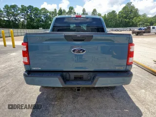 2023 Ford F-150 XL with VIN 1FTEW1CP7PKD02399, listed as a Copart auction lot 60738155 with 23,059 mi miles and Salvage title. Bid and sale history available at DreamBid. Image 6.