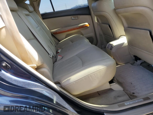 2006 Lexus RX 400h z VIN JTJHW31U460036526, wystawiony jako Copart lot #61182775 z przebiegiem 282 993 mil mil oraz Czysty tytuł • Clean title. Historia ofert i sprzedaży dostępna na DreamBid. Obrazek 11.