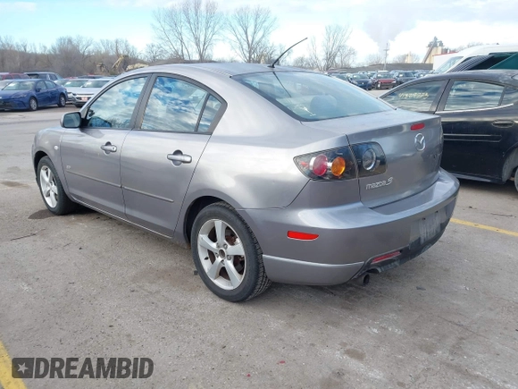 2005 Mazda 3 s with VIN JM1BK323551245843, listed as a IAAI auction lot 41860274 with 166,579 mi miles. Bid and sale history available at carsss.com. Image 3.