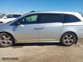 2013 Honda Odyssey Touring with VIN 5FNRL5H93DB076463, listed as a IAAI auction lot 41819994 with 188,911 mi miles. Bid and sale history available at carsss.com. Image 14.