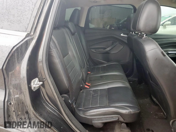 2014 Ford Escape Titanium с VIN 1FMCU0J90EUA04690, выставлен на аукционе Copart как лот 58421735 с пробегом 200 743 миль миль и Чистый • Clean title. История ставок и продаж доступна на DreamBid. Изображение 11.