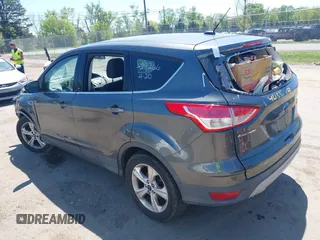2016 Ford Escape SE z VIN 1FMCU9GX1GUB92472, wystawiony jako IAAI lot #42133744 z przebiegiem 184 000 mil mil oraz . Historia ofert i sprzedaży dostępna na DreamBid. Obrazek 3.