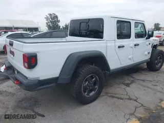 2022 Jeep Gladiator Rubicon with VIN 1C6JJTBG9NL113990, listed as a IAAI auction lot 38583176 with 31,520 mi miles. Bid and sale history available at carsss.com. Image 4.