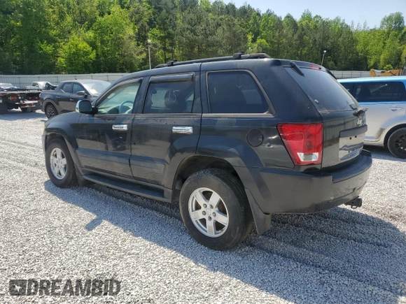 2005 Jeep Grand Cherokee Laredo with VIN 1J4HS48N85C570784, listed as a Copart auction lot 53668255 with 165,223 mi miles and Clean Title. Bid and sale history available at DreamBid. Image 2.